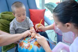 Sorrisos que inspiram na luta pela cura